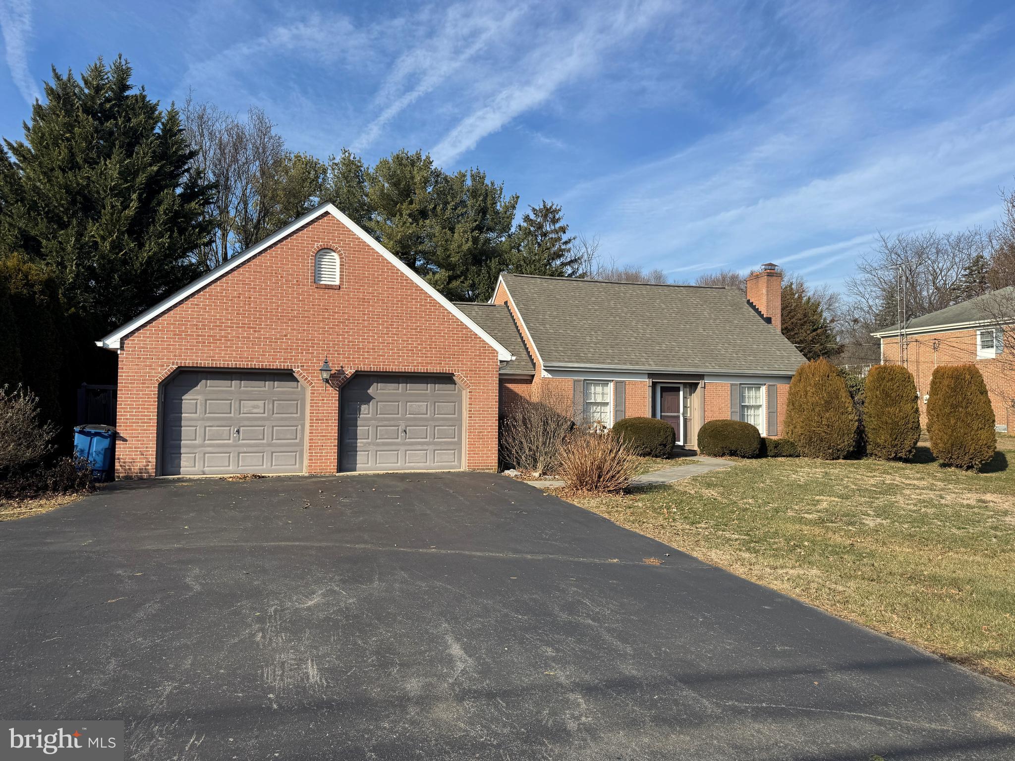 13632 Paradise Church Road Hagerstown, MD 21742 - Photo 3 of 47 a front view of a house with a yard and garage