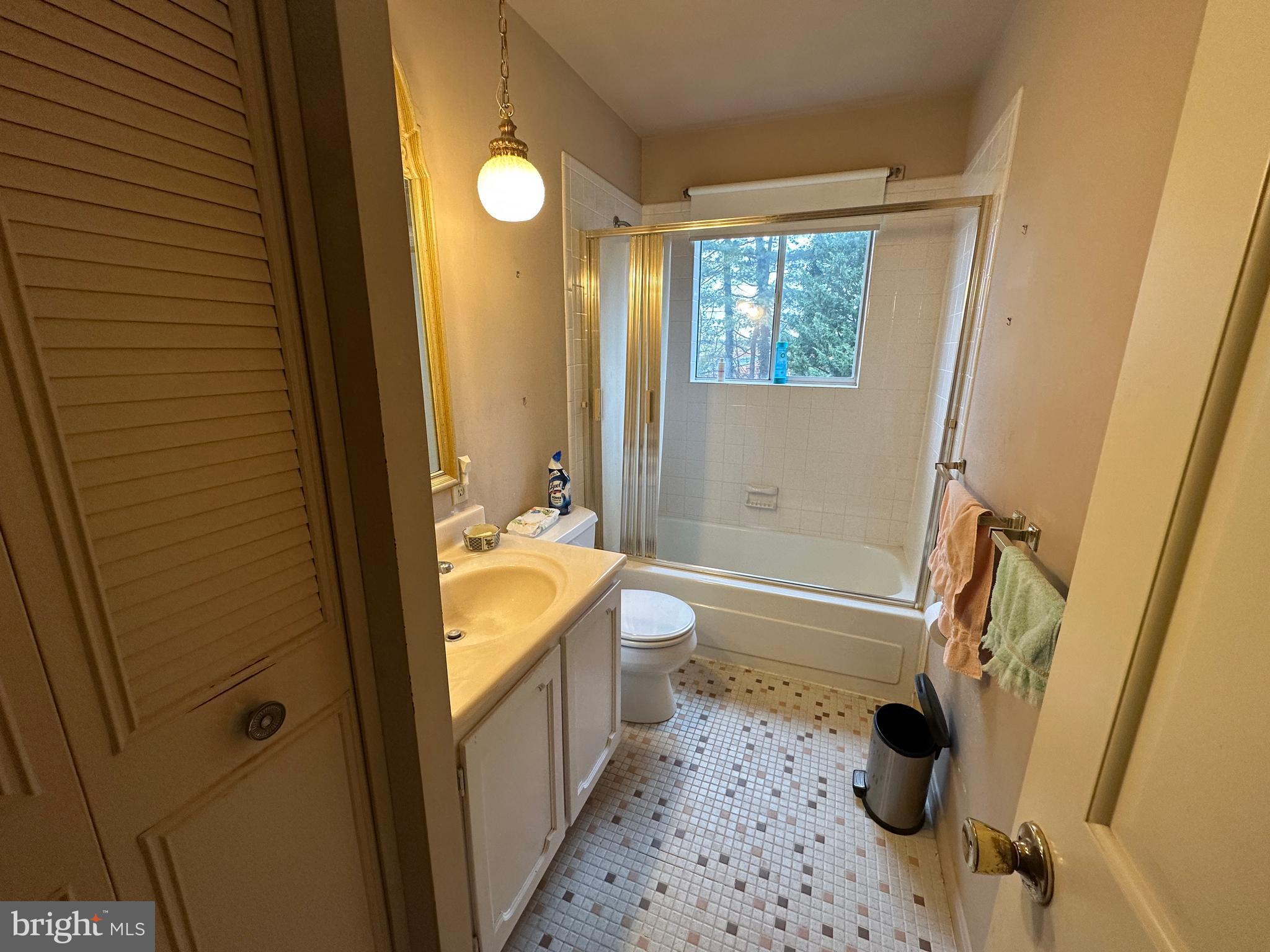 13632 Paradise Church Road Hagerstown, MD 21742 - Photo 36 of 47 a bathroom with a tub a toilet and a sink