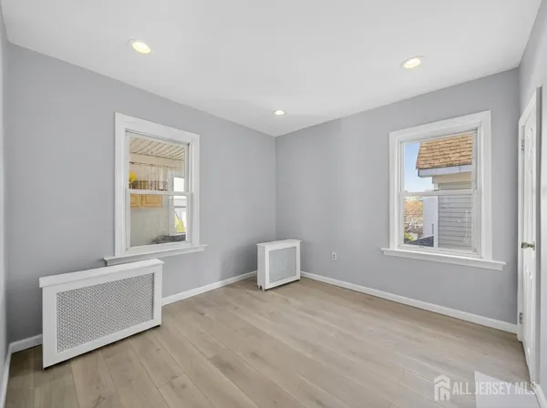 a bathroom with a sink toilet tub and shower