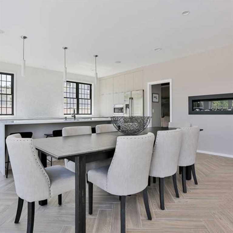1 B Lot Rockland Street Hingham, MA 02043 - Photo 11 of 14 a view of a dining room with furniture and wooden floor