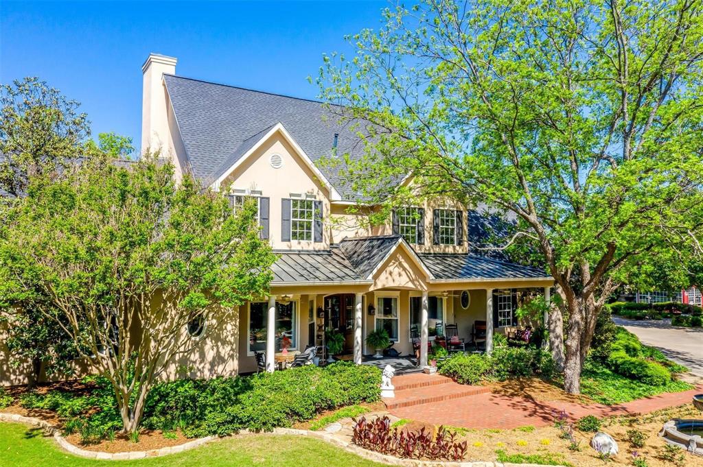 1020 Post Oak Road Copper Canyon, TX 76226 - Photo 1 of 1 a front view of a house with a garden