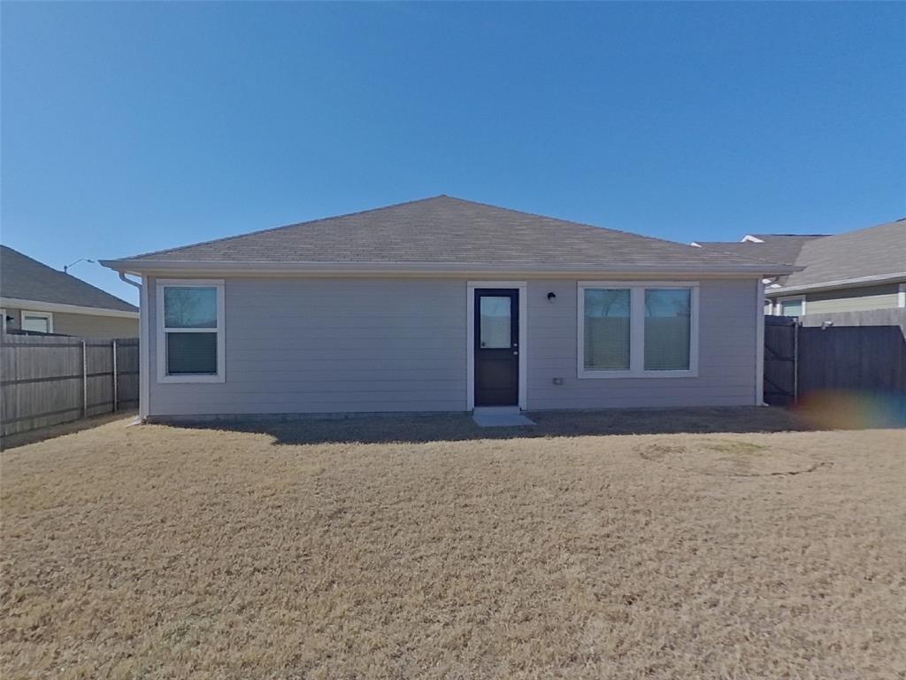 11856 Mancos Trail Rhome, TX 76078 - Photo 15 of 16 a view of house with yard
