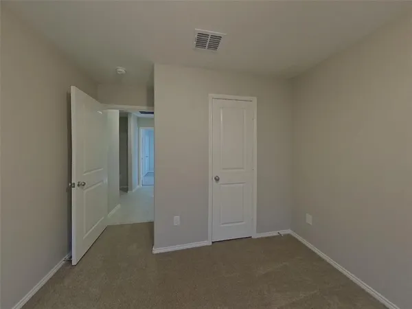 an empty room with closet