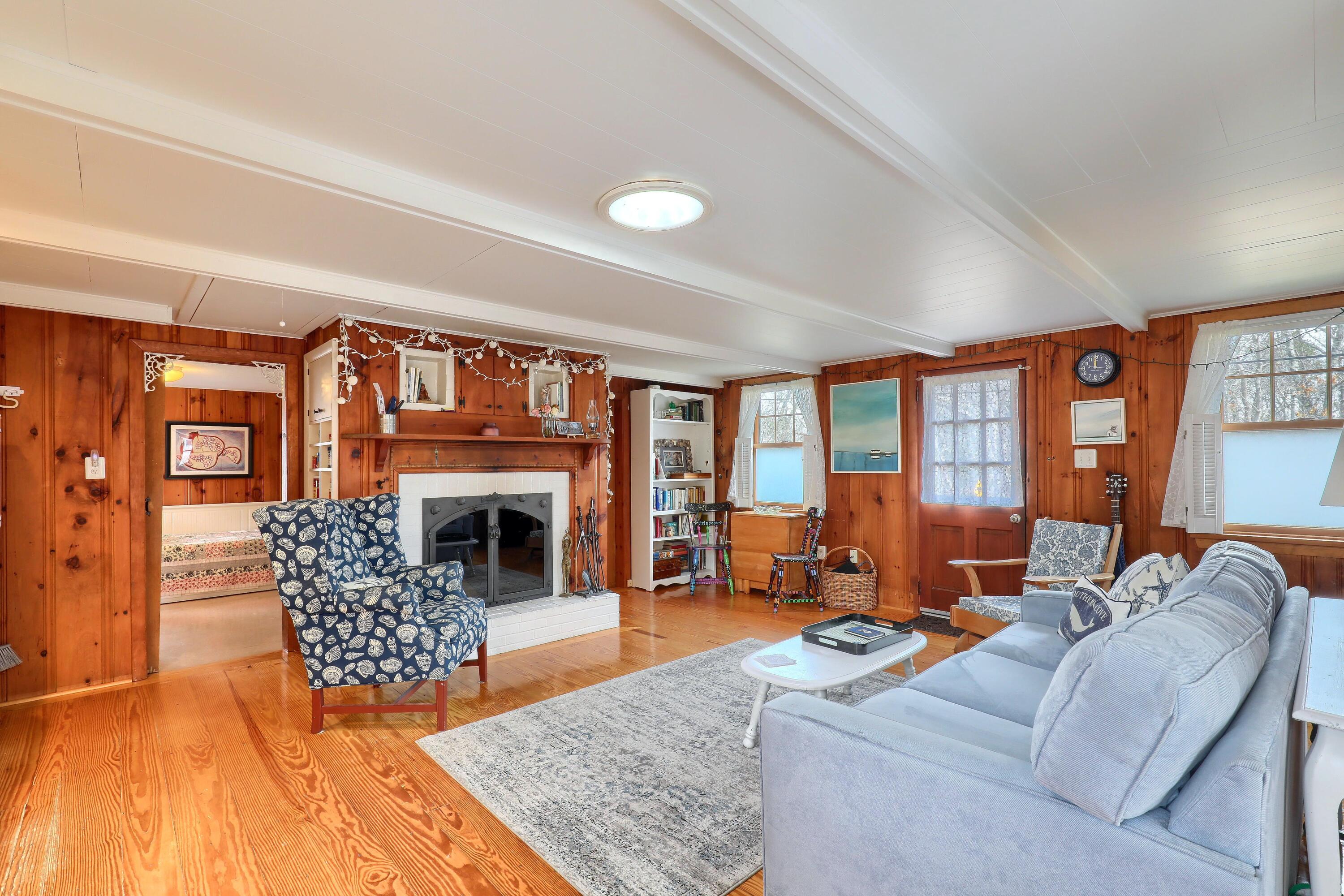 565 Higgins Road Eastham, MA 02642 - Photo 4 of 39 01_Living_Room_IMG_0359