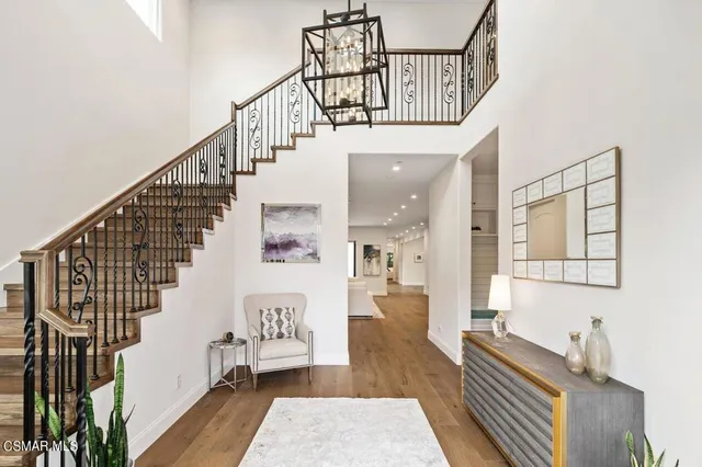 a living room with fireplace furniture and a flat screen tv