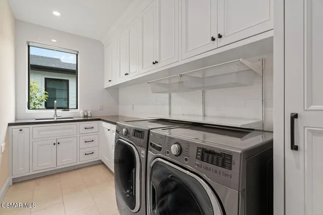 a view of a patio with table and chairs