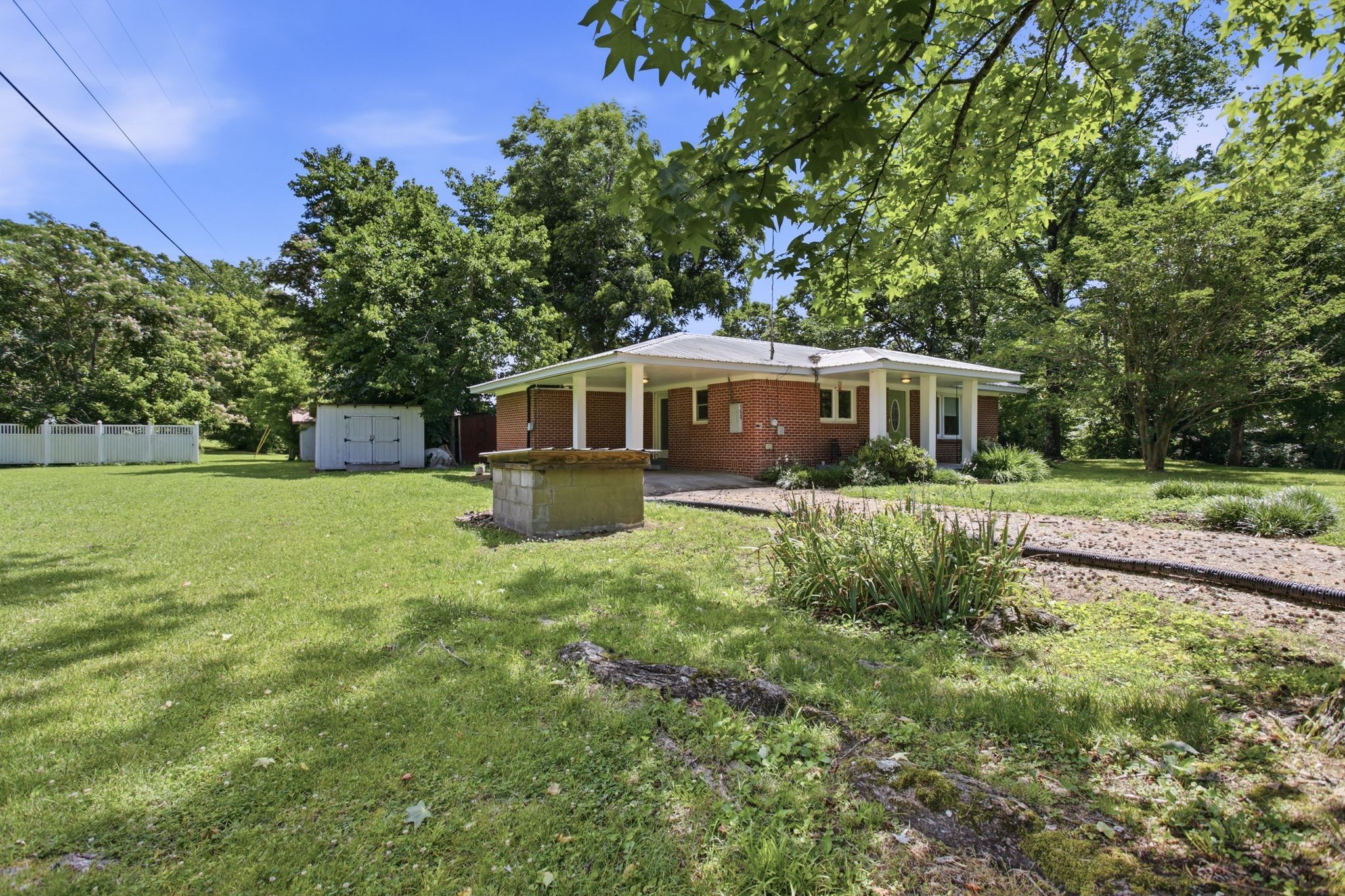150 Toms Creek Road Linden, TN 37096 - Photo 16 of 23 a house view with a swimming pool