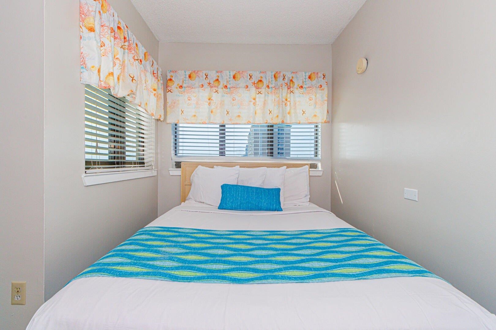 1605 South Ocean Boulevard, Unit 505 Myrtle Beach, SC 29577 - Photo 13 of 38 Bedroom featuring multiple windows