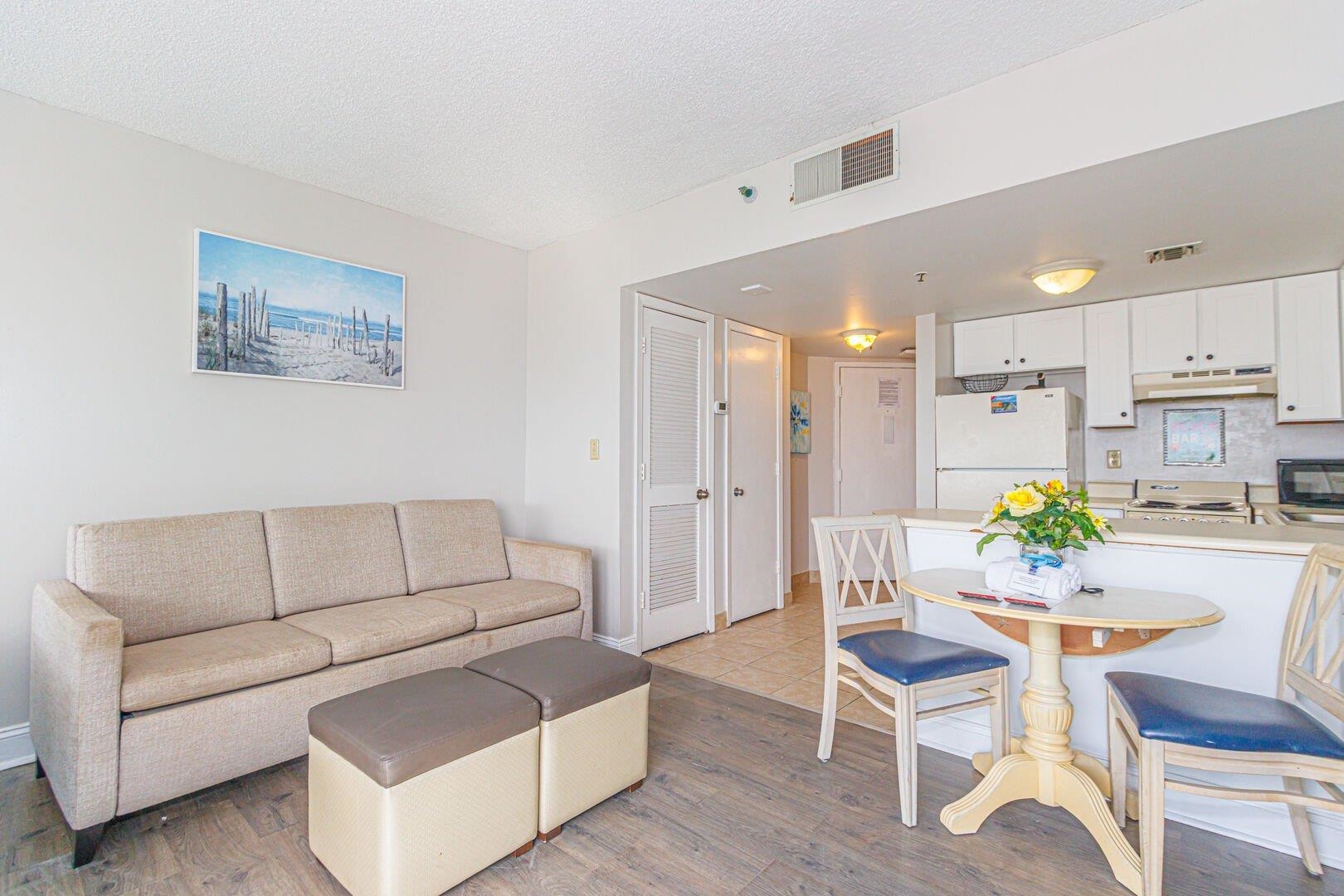 1605 South Ocean Boulevard, Unit 505 Myrtle Beach, SC 29577 - Photo 14 of 38 Living area featuring light wood-style floors and a textured ceiling