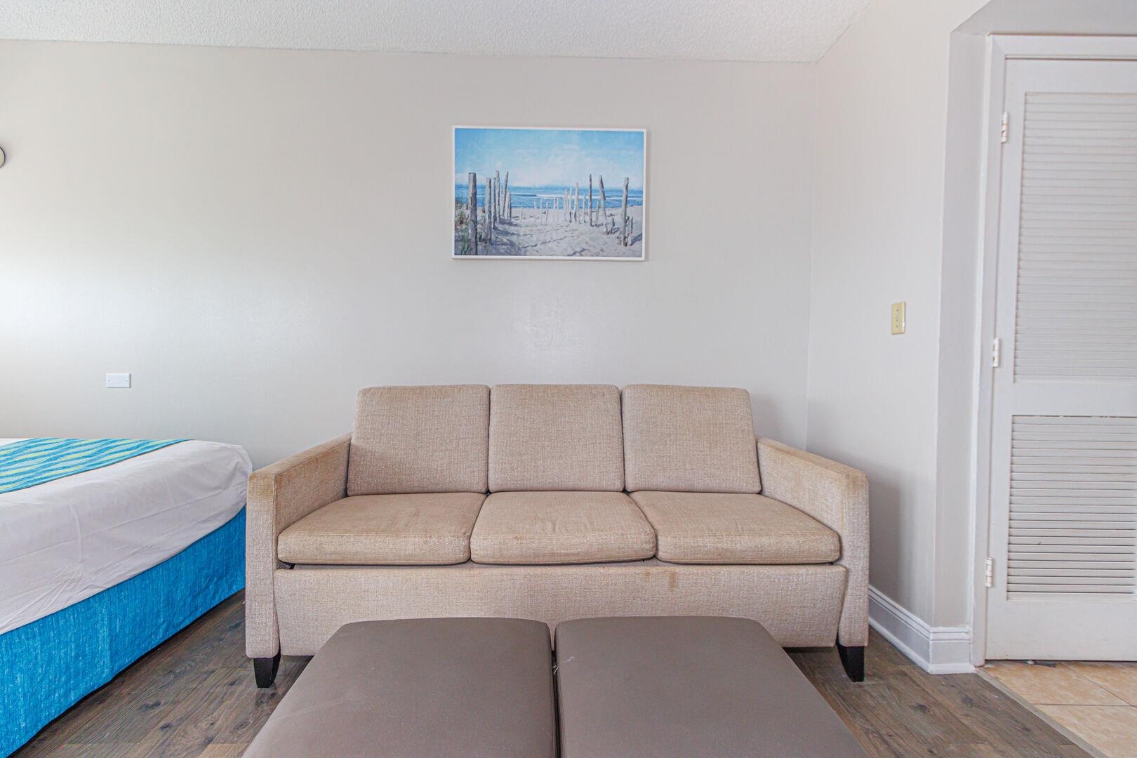 1605 South Ocean Boulevard, Unit 505 Myrtle Beach, SC 29577 - Photo 16 of 38 Living room featuring wood finished floors and a textured ceiling