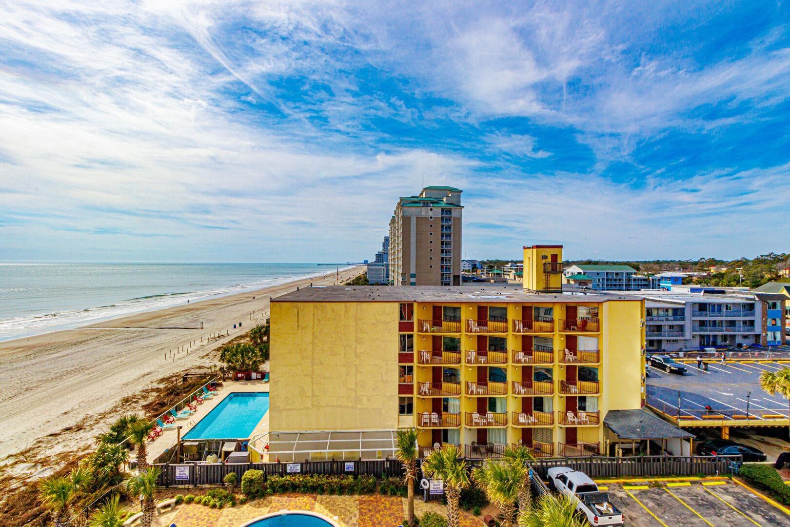 1605 South Ocean Boulevard, Unit 505 Myrtle Beach, SC 29577 - Photo 2 of 38 Bird's eye view of expansive coastline and a pool