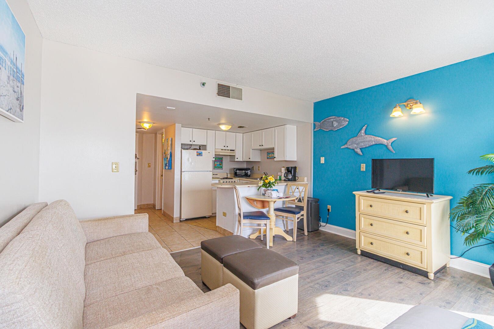 1605 South Ocean Boulevard, Unit 505 Myrtle Beach, SC 29577 - Photo 8 of 38 Living area with light wood-style flooring and a textured ceiling