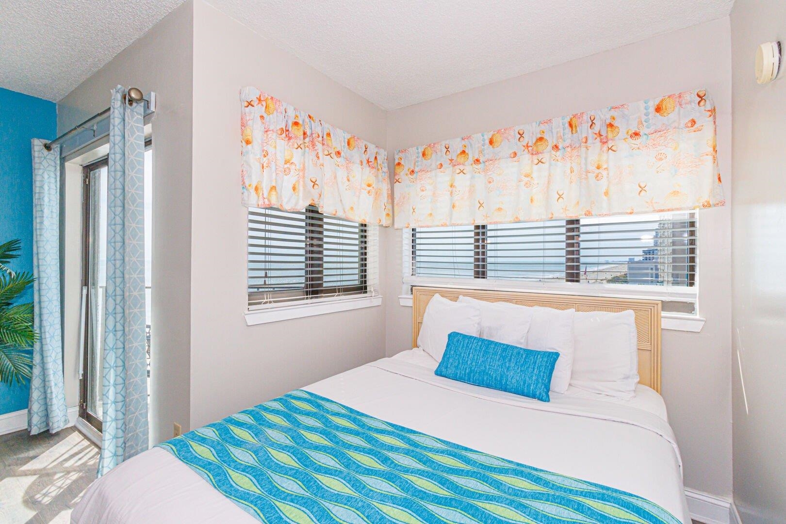1605 South Ocean Boulevard, Unit 505 Myrtle Beach, SC 29577 - Photo 10 of 38 Bedroom featuring a textured ceiling and baseboards
