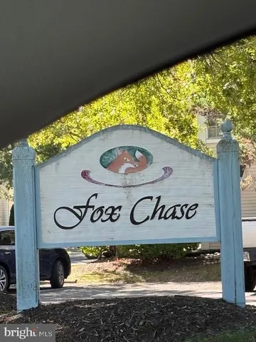 a view of sign board with an outdoor space