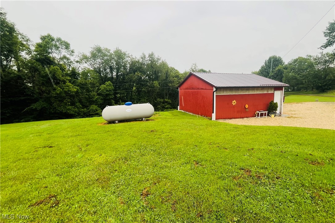 91070 Kilgore Ridge Road Scio, OH 43988 - Photo 32 of 40 View of grassy yard featuring an outdoor structure