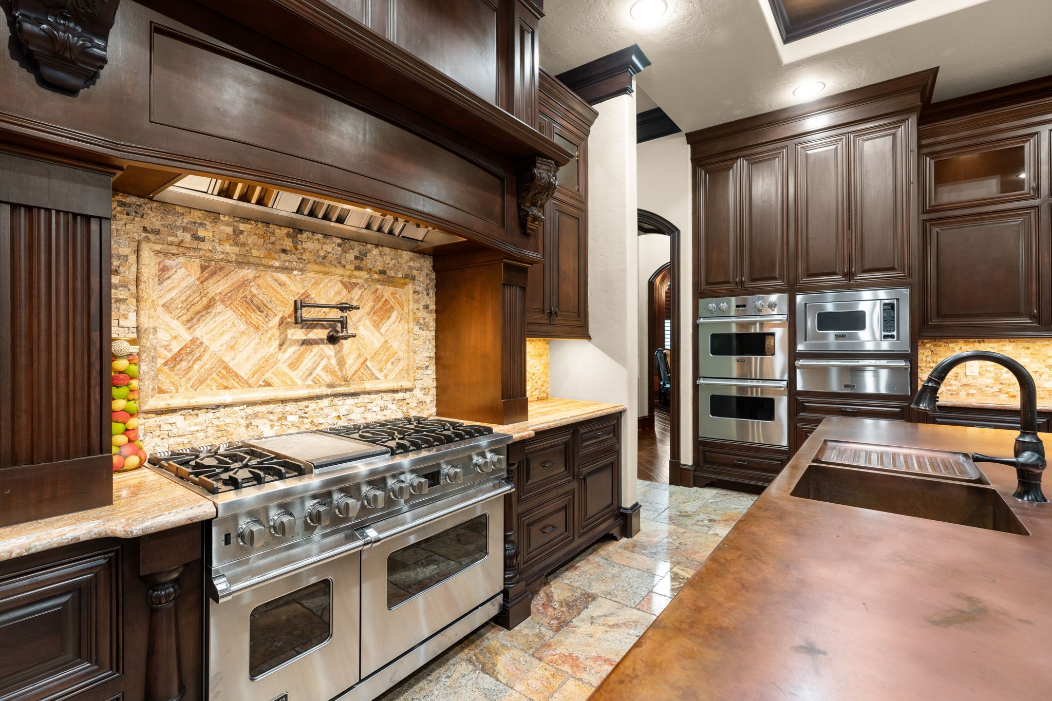 7918 Red Bay Circle Magnolia, TX 77354 - Photo 19 of 50 a kitchen with stainless steel appliances granite countertop a stove and a refrigerator