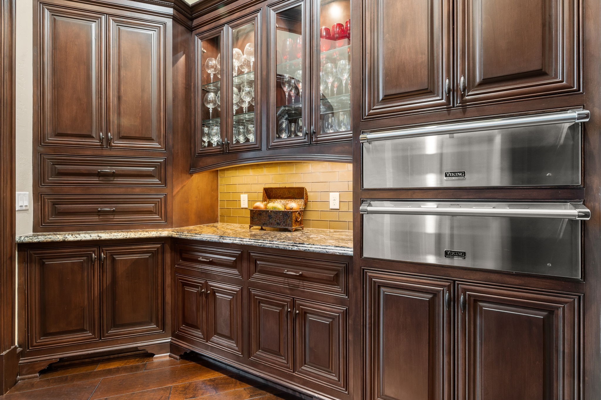 7918 Red Bay Circle Magnolia, TX 77354 - Photo 21 of 50 a kitchen with stainless steel appliances granite countertop a stove and a microwave