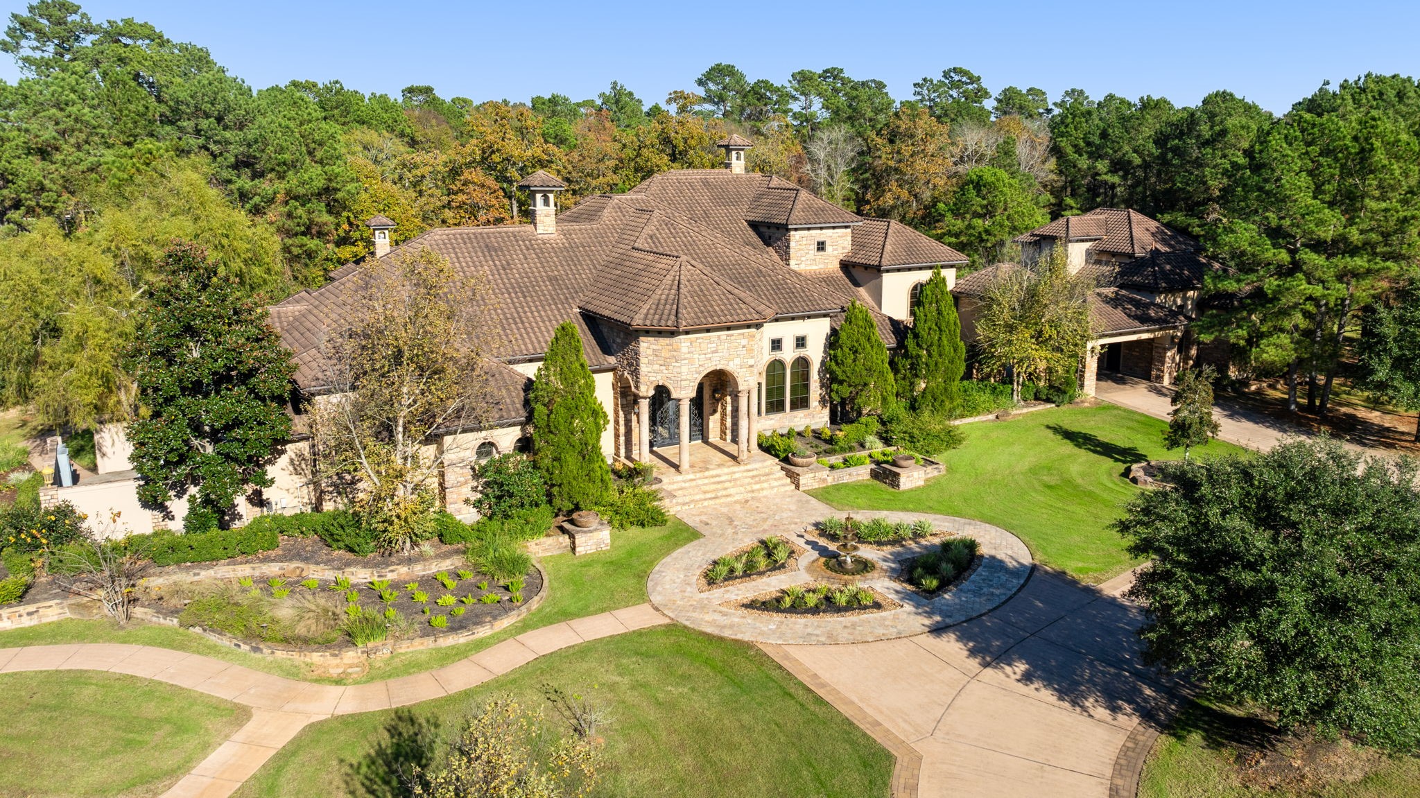 7918 Red Bay Circle Magnolia, TX 77354 - Photo 3 of 50 an aerial view of a house with yard swimming pool and outdoor seating