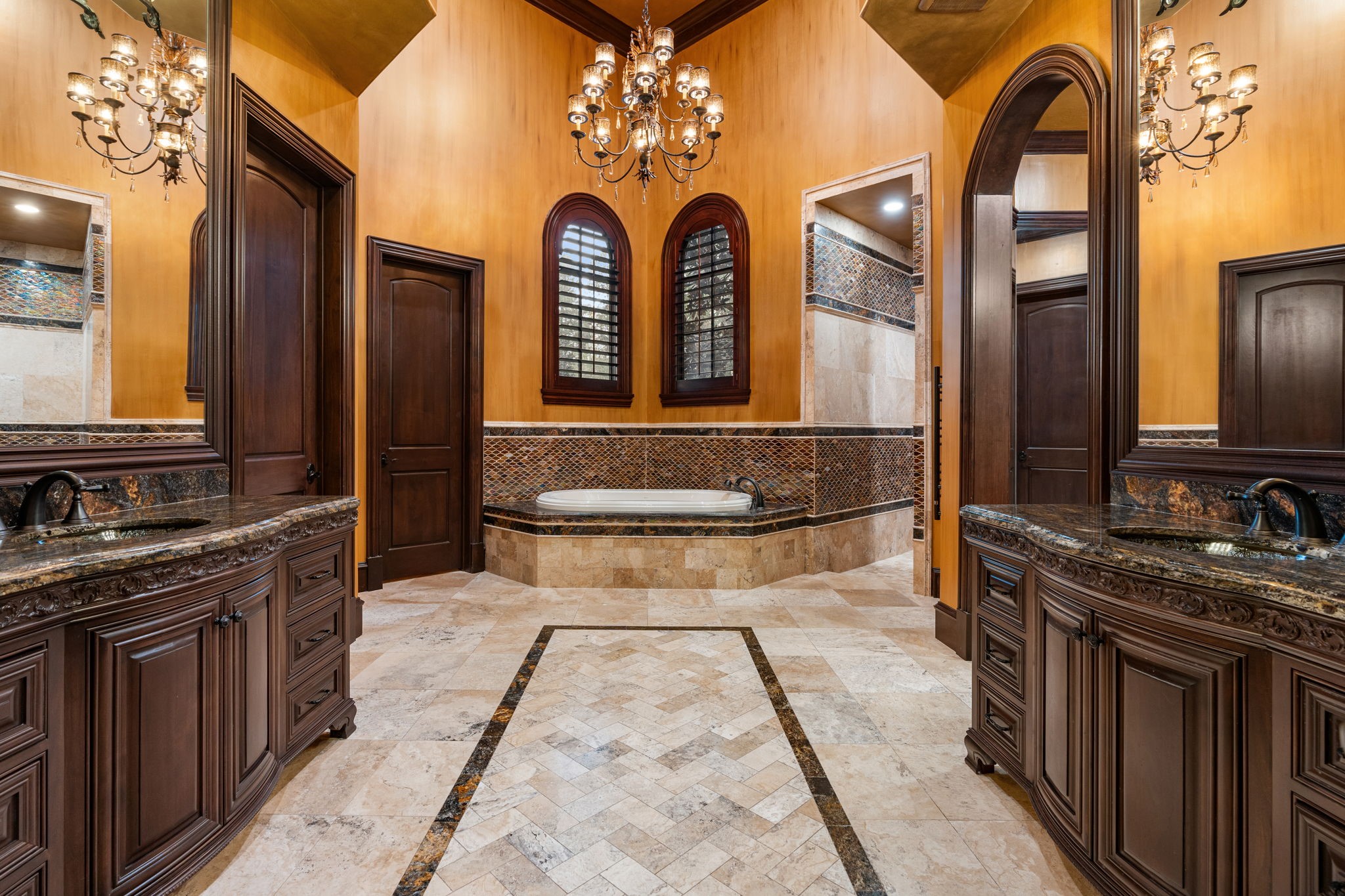 7918 Red Bay Circle Magnolia, TX 77354 - Photo 33 of 50 a bathroom with a granite countertop sink a mirror and a shower