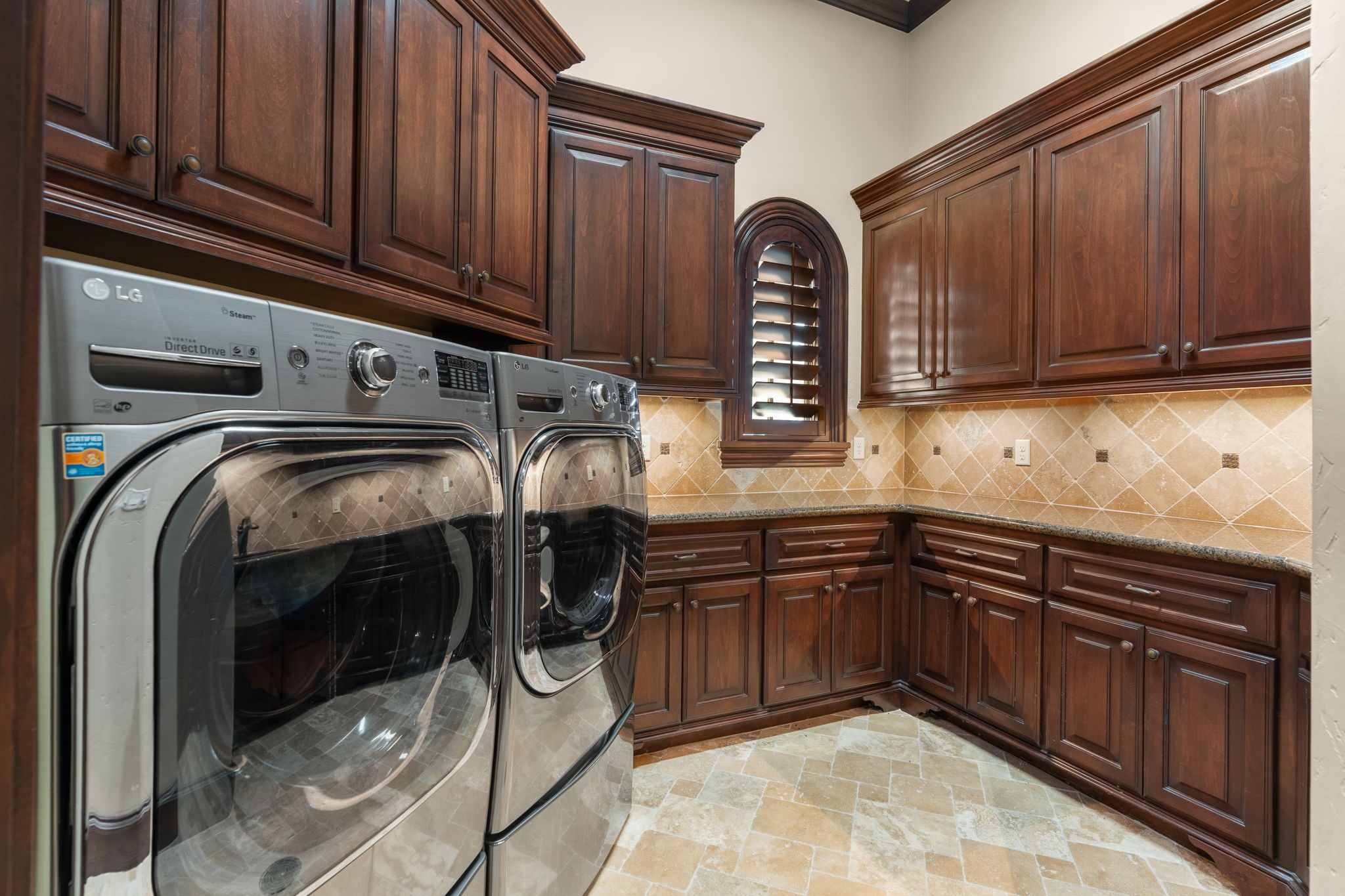 7918 Red Bay Circle Magnolia, TX 77354 - Photo 34 of 50 a kitchen with stainless steel appliances granite countertop a sink and cabinets