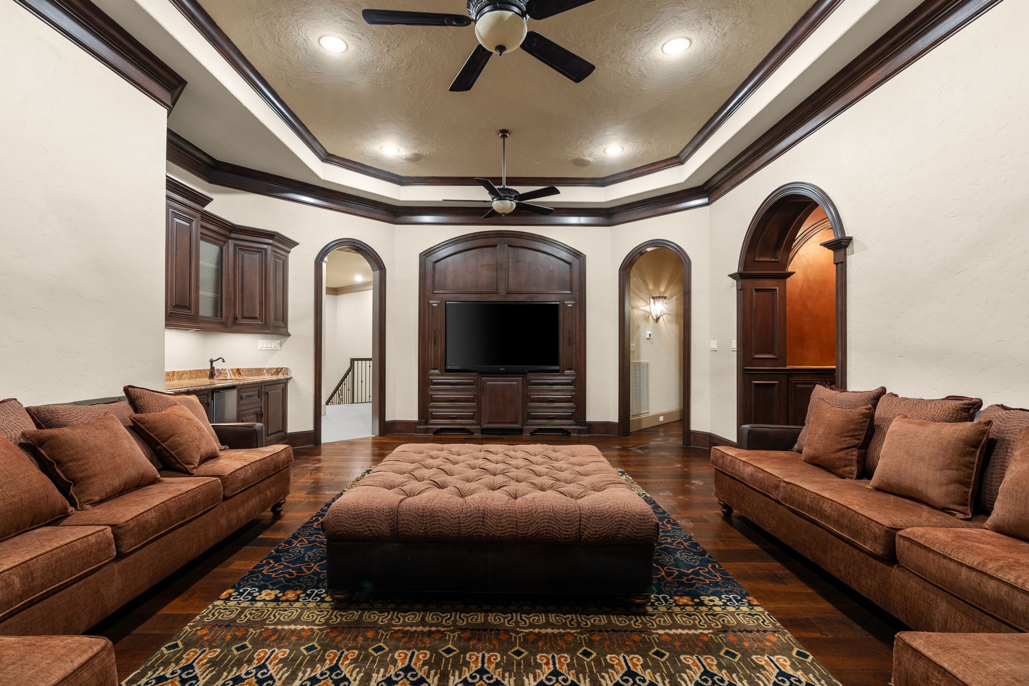 7918 Red Bay Circle Magnolia, TX 77354 - Photo 38 of 50 a spacious bedroom with a bed a couch and ceiling fan