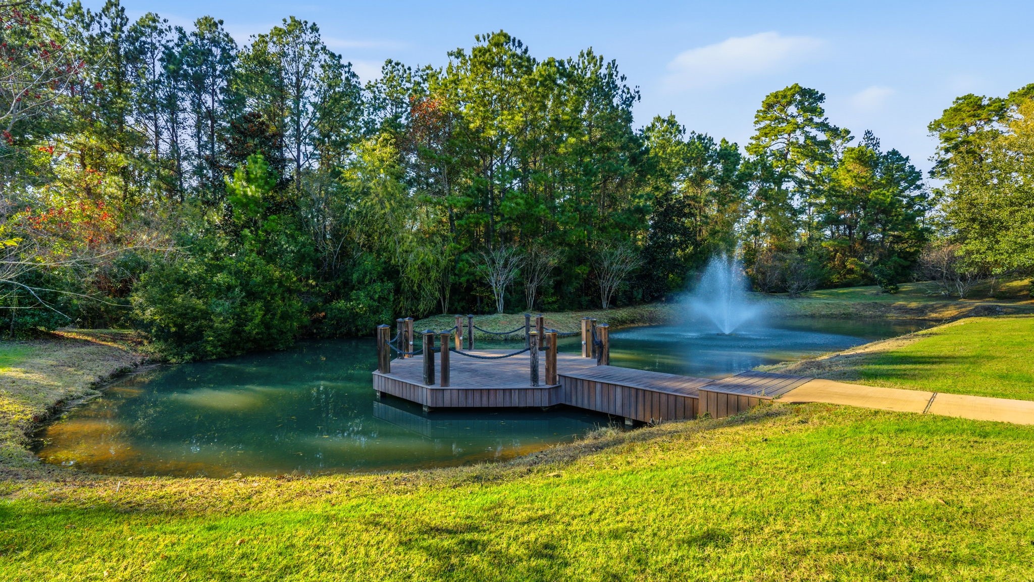 7918 Red Bay Circle Magnolia, TX 77354 - Photo 45 of 50 a view of a wooden deck with chairs and a yard