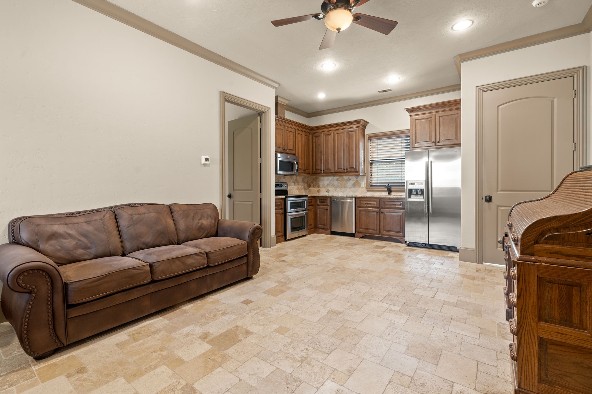 7918 Red Bay Circle Magnolia, TX 77354 - Photo 49 of 50 a living room with stainless steel appliances granite countertop furniture and a kitchen view