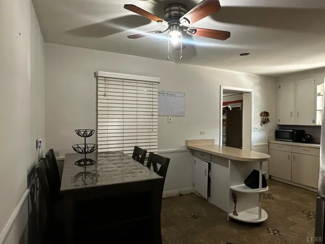a bathroom with a sink toilet and mirror