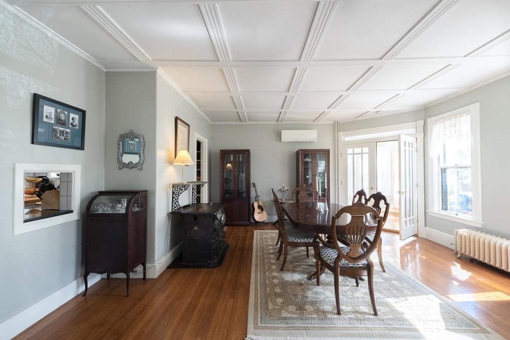 187 Pleasant Street Framingham, MA 01701 - Photo 14 of 39 a view of a dining room with furniture and wooden floor