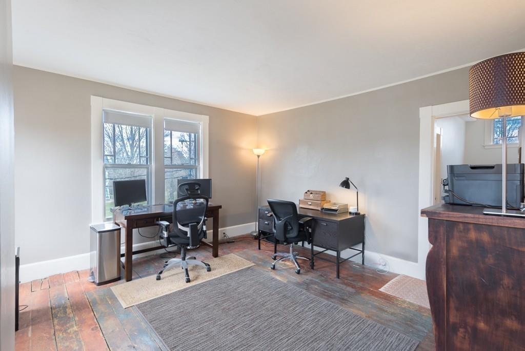187 Pleasant Street Framingham, MA 01701 - Photo 23 of 39 a workspace with furniture hardwood and a window