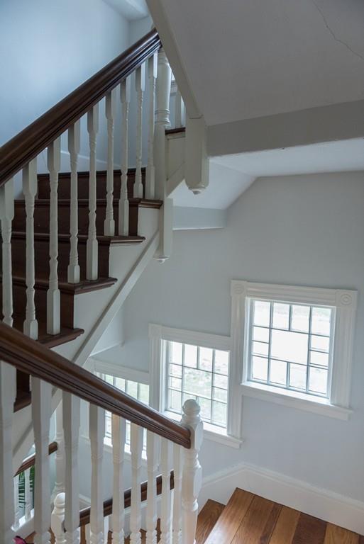187 Pleasant Street Framingham, MA 01701 - Photo 28 of 39 a view of staircase with lots of windows