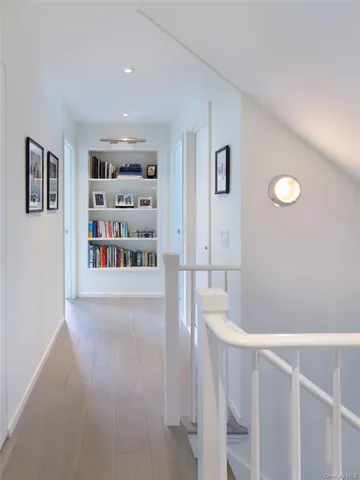 a view of an empty room with shelves