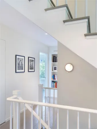 a view of a hallway with windows