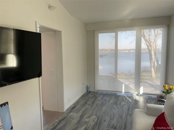 a view of livingroom with hardwood floor and window