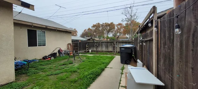 a view of a back yard of the house