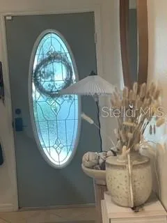 a view of living room with furniture and a flat screen tv