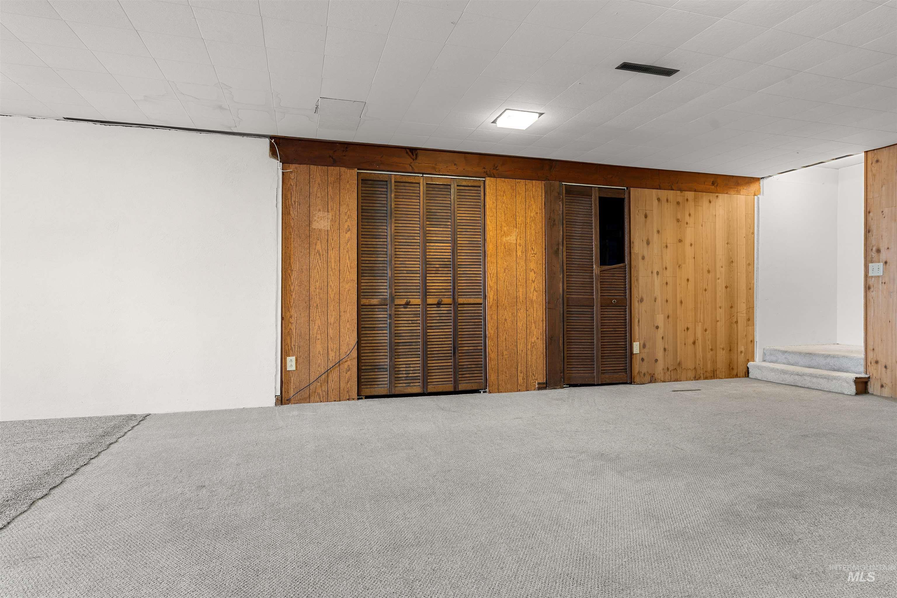 1148 Webster Street Clarkston, WA 99403 - Photo 22 of 29 Finished below grade area featuring carpet floors and wooden walls