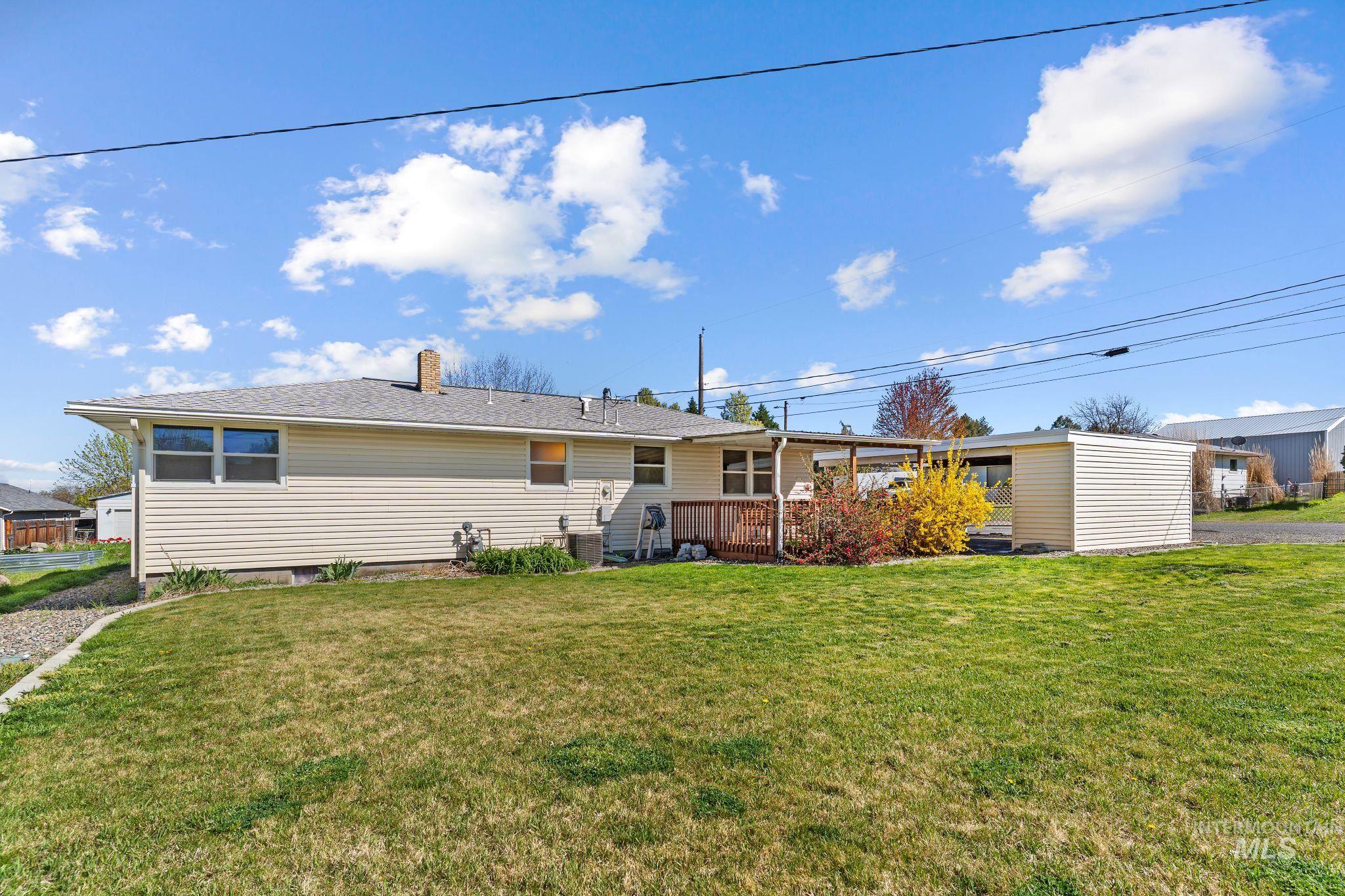 1148 Webster Street Clarkston, WA 99403 - Photo 27 of 29 Back of house with a deck.