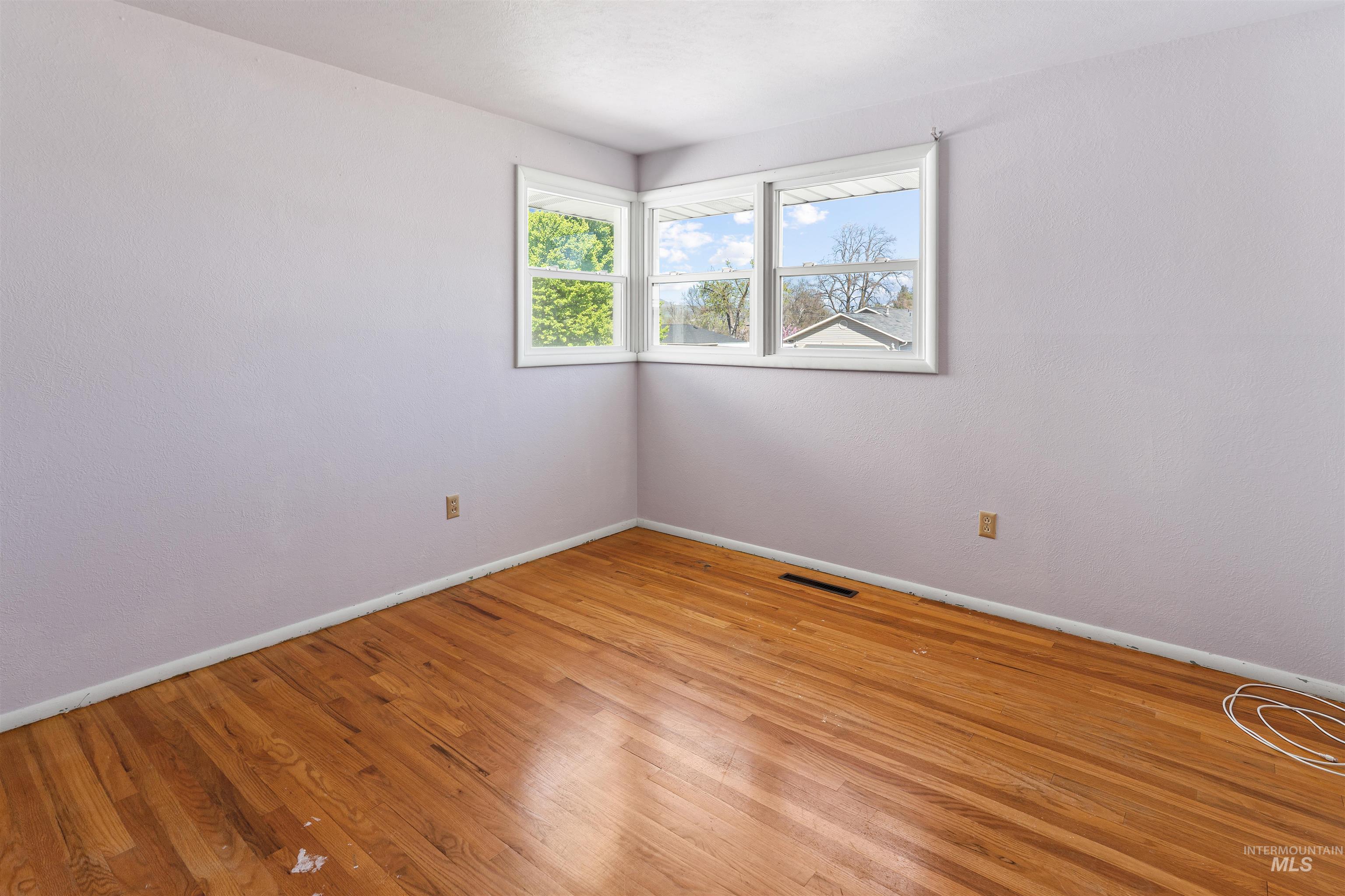 1148 Webster Street Clarkston, WA 99403 - Photo 6 of 29 Spare room featuring baseboards and light wood finished floors