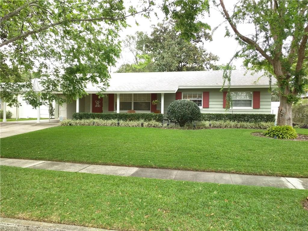 412 Cornwall Road Winter Park, FL 32792 - Photo 1 of 1 a front view of house with yard and green space