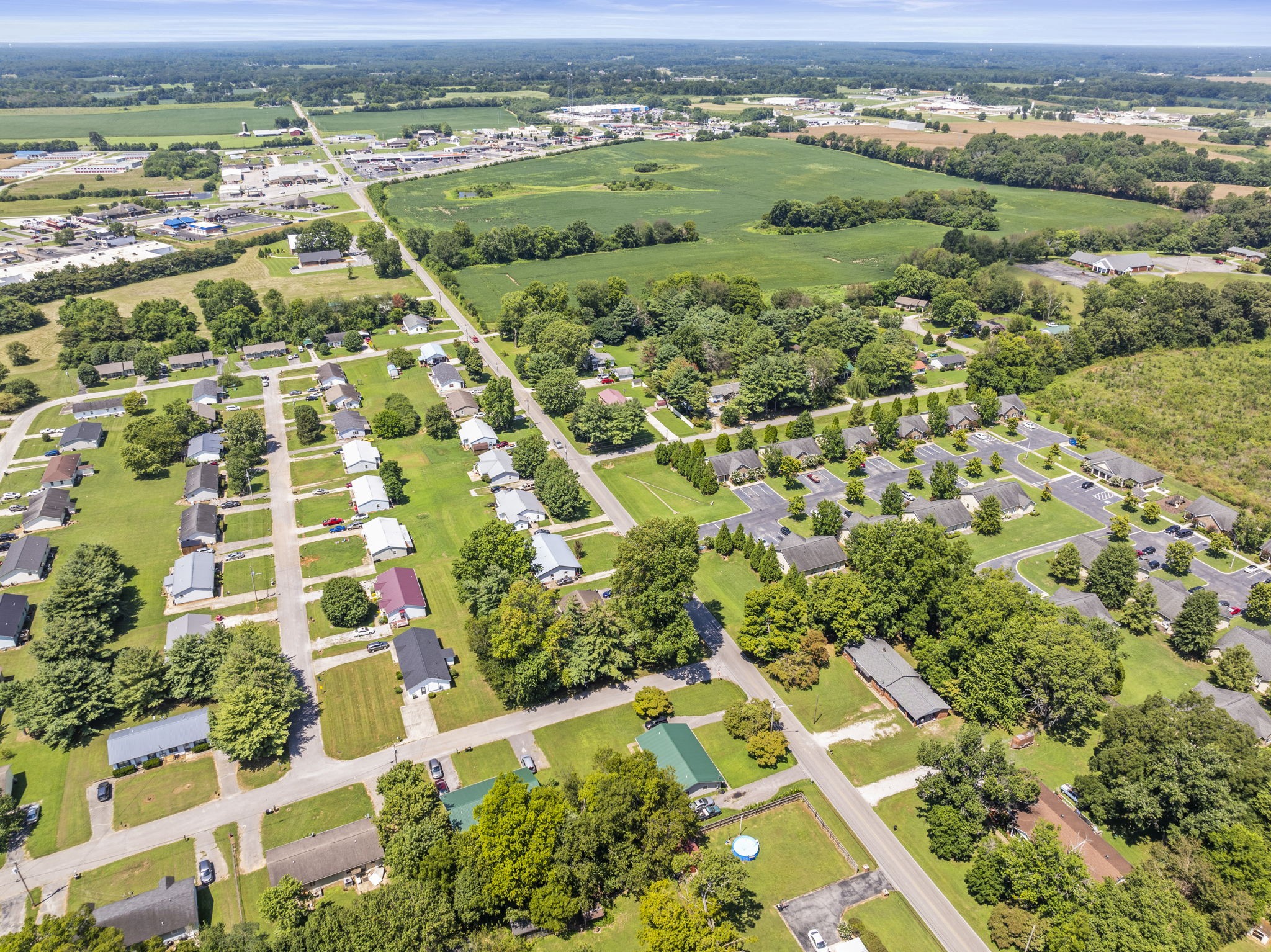 1101 Cumberland Street Decherd, TN 37324 - Photo 8 of 9 an aerial view of residential houses with outdoor space