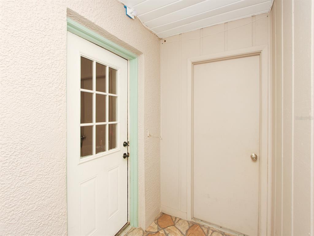 4173 Signal Hill Road Orlando, FL 32808 - Photo 3 of 22 a view of front door
