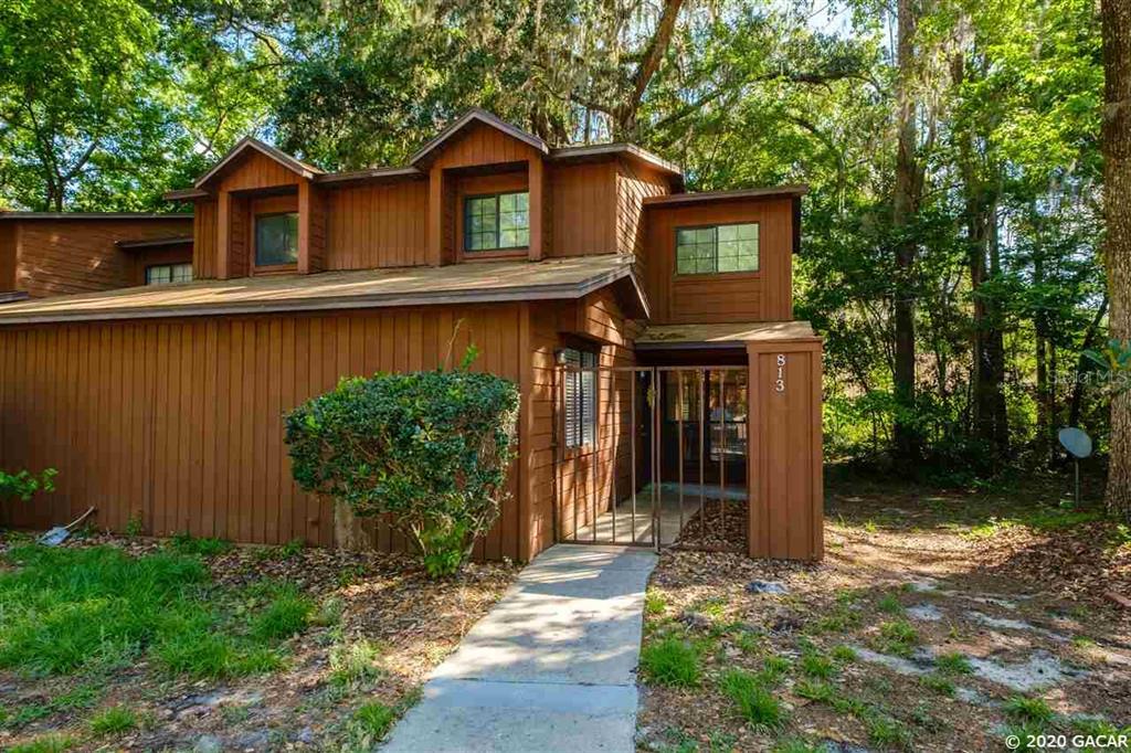 813 Southwest 55th Terrace Gainesville, FL 32607 - Photo 1 of 1 a house view with a outdoor space