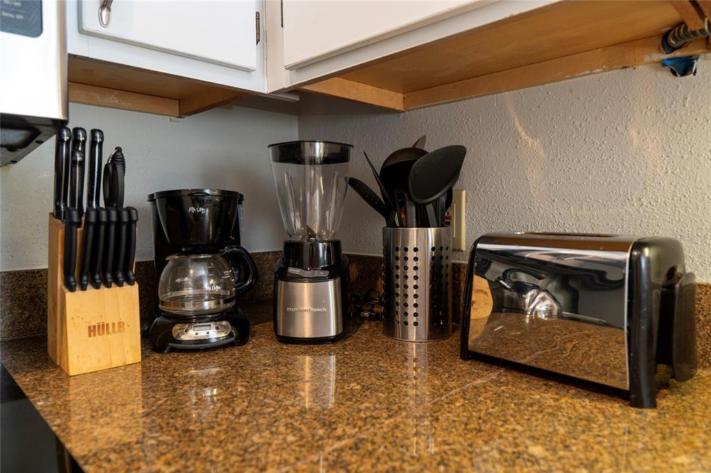 3100 Parkway Boulevard, Unit 511 Kissimmee, FL 34747 - Photo 12 of 40 a living room with furniture and a fireplace