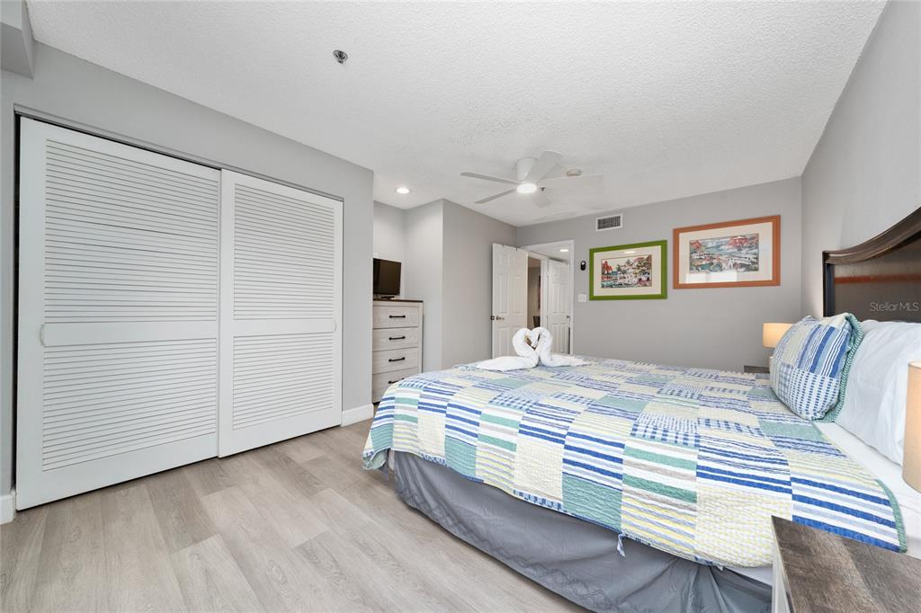 3100 Parkway Boulevard, Unit 511 Kissimmee, FL 34747 - Photo 20 of 40 a bedroom with a bed and closet