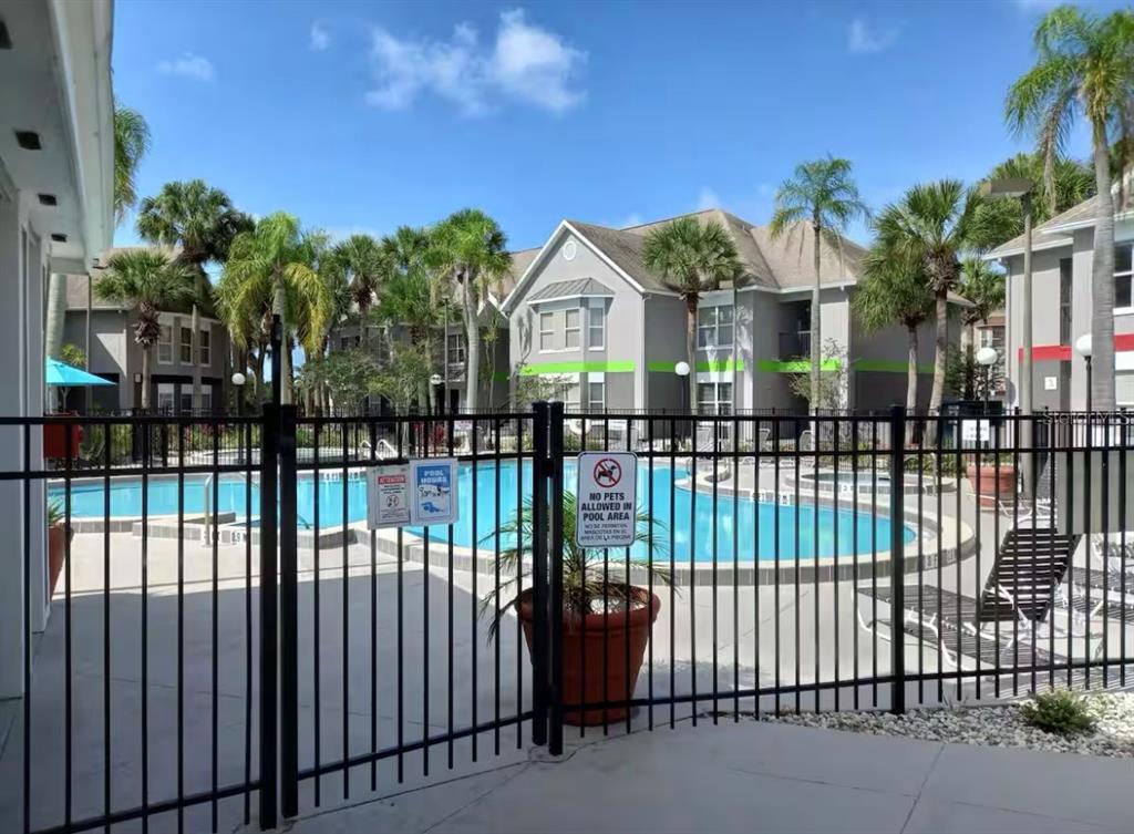 3100 Parkway Boulevard, Unit 511 Kissimmee, FL 34747 - Photo 31 of 40 a view of a house with a iron gate
