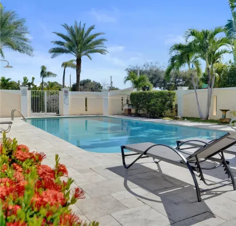 a view of a backyard and a patio
