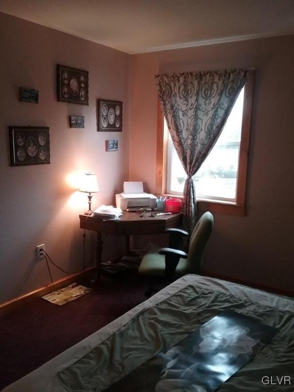 135 Longley Road Nazareth, PA 18064 - Photo 16 of 35 a bedroom with a bed table chair and a window