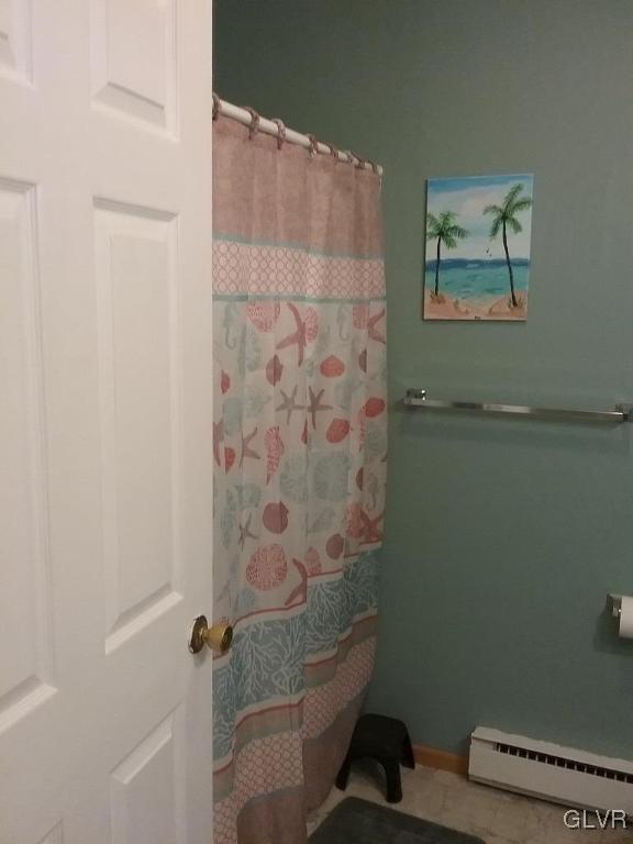 135 Longley Road Nazareth, PA 18064 - Photo 17 of 35 a bathroom with a shower and a toilet