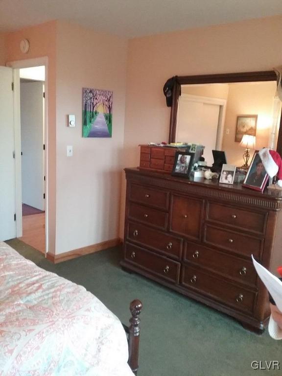 135 Longley Road Nazareth, PA 18064 - Photo 21 of 35 a bedroom with a bed and a mirror on dresser